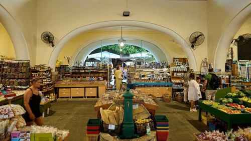 Agora, Municipal Market Hall, A busy marketplace with various food stalls and people, Kos Town,