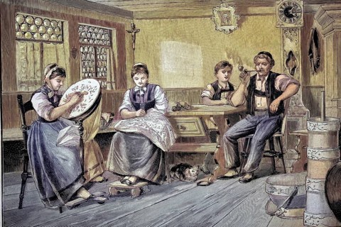 Family on a Sunday afternoon in a living room on a farm in the Appenzell area, a region in