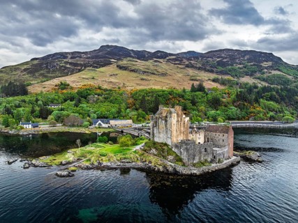 Eilean Donan Castle and Loch Duich from a drone, Isle of Skye, Highlands, Scotland, England, United