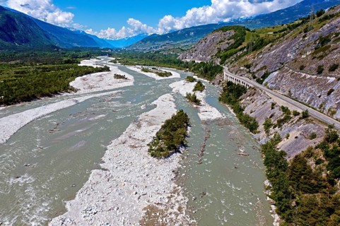 Unregulated river course in a natural riverbed, the Rhone, also known as the Rotten, flows through