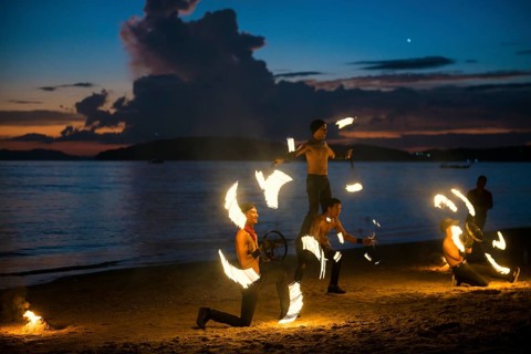 Fire show, jugglers with fire, Ao Nang Beach, sunset, Ao Nang, Krabi, Thailand