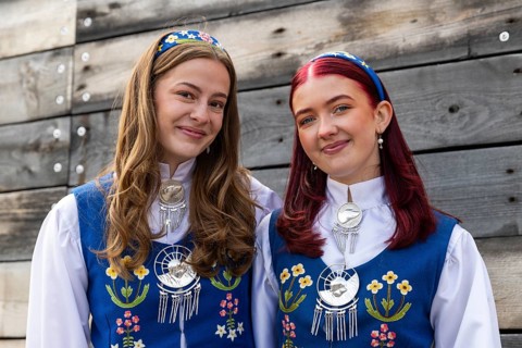 Young woman in traditional traditional costume at the reception for King Harald at the end of coal