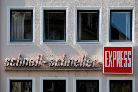 Writing on a wall of a house fast fast express, German newspaper, regional tabloid, Bonn, North