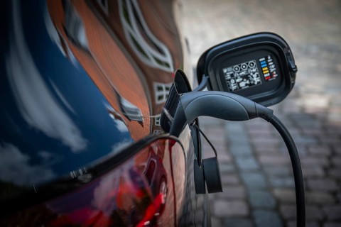 Close-up of an electric car charging at a charging station, Ringkøbing, Ringkøbing Fjord, Denmark