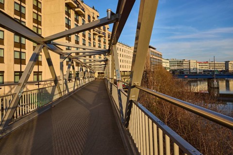 Modern architecture, footbridge, metal railing, river Saar, blue sky, cirrostratus clouds, evening
