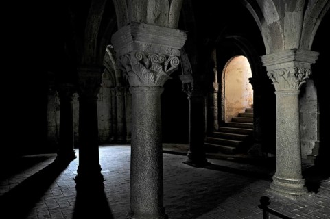 Vaults, columns with capitals, underground grove of columns, pagan crypt, 10th century, gloomy