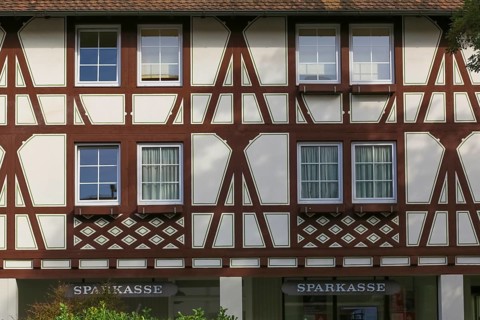 Half-timbered house, facade, savings bank, lettering, letters, mullioned window, Oberuhldingen