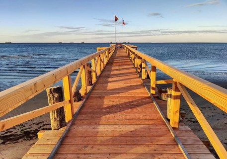 New south beach bridge at atmospheric sunrise with a view of Amrum, Südstrand, Wyk auf Föhr, North