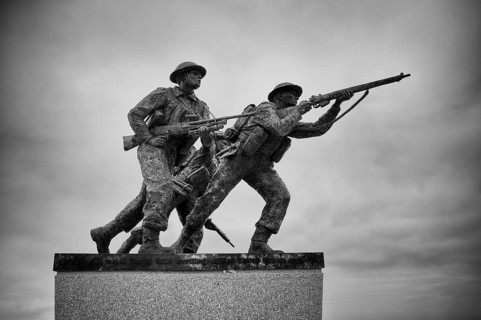 Three fighting soldiers, sculpture, British Normandy Memorial, war memorial, black and white,
