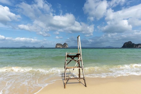 A lonely boarding and disembarking ladder for longtail boats on the beach of Koh Ngai Island,