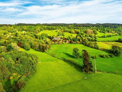 Farms over Coniston Water from drone, Lake District National Park, Cumbria, UK
