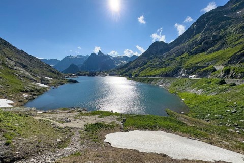 View from Swiss territory to Italian territory over mountain lake Lac du Grand Saint Bernard on top