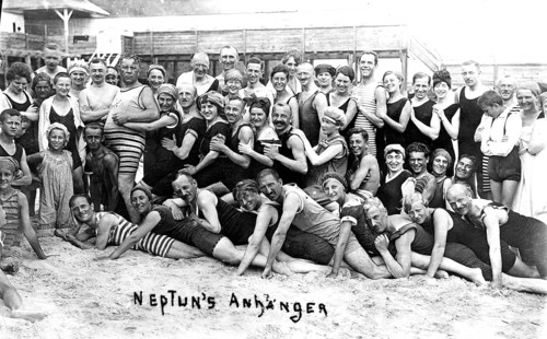 Large bathing group, 1930s, Large group of people in swimwear smiling on the beach, Historical