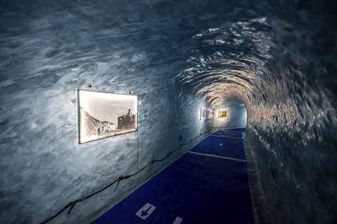 Artificial ice cave through the glacier ice, Mer de Glace, Montenvers, Chamonix, Haute-Savoie,