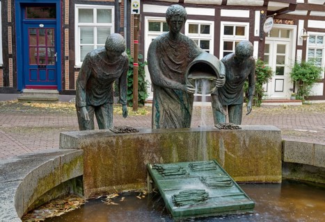 The asparagus fountain in Mühlenstraße, a historical sight in the old town centre of Nienburg an