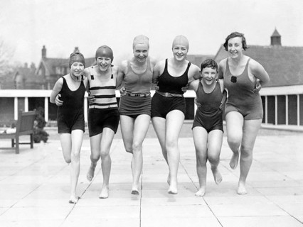 Group of woman in swimwear on a jetty, 1930s, woman in swimming costumes smiling and posing happily