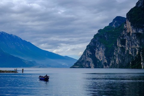 Fisherman, fishing boat near Riva del Garda, Lake Garda, Trentino, Trentino-Alto Adige, IItaly