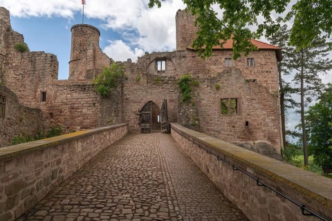 Entrance to the partially restored medieval castle ruins of Hanstein on a red sandstone rock,