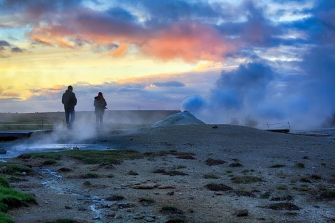Walkers, sulphur vapour, fumarole, solfataras in the Hveravellir geothermal area, sunset, Icelandic