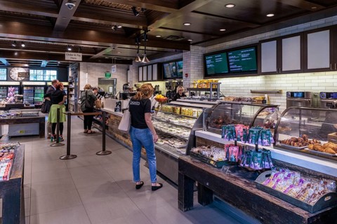 Guests shopping for coffee, food, and snacks at the Starbucks in Gaylord Opryland Resort and