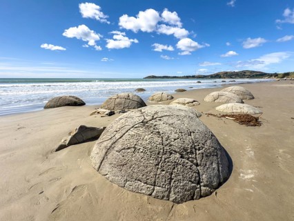 Round stones of the Moeraki Boulders at Moeraki Beach, Moeraki, South Island, New Zealand, Oceania