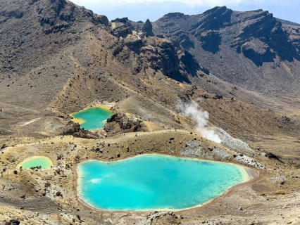 On the hiking trail of the Tongariro Alpine Crossing in Tongariro National Park with a view of the