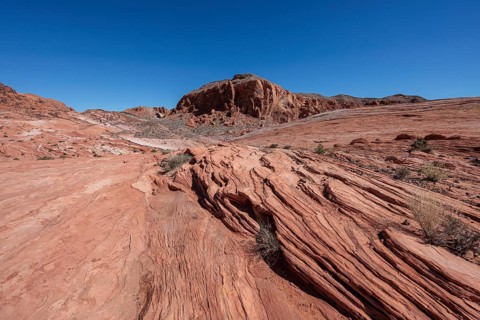 Layered rock formations along the Fire Wave Trail at Valley of Fire State Park near Overton, Nevada