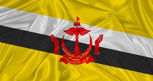 Flag of Brunei with cloth texture. Close up of Brunei flag waving