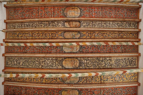 Wooden ceiling with wood carving and painting from the 17th century, interior view, wooden beams,