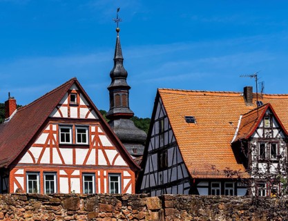 The old town centre with half-timbered houses, church towers and remains of the town wall in
