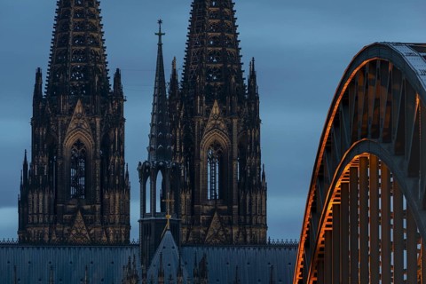 Cologne Cathedral and the Hohenzollern Bridge illuminated with LED lights, Cologne, North