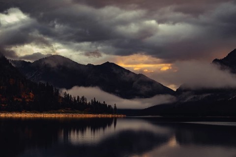 Surreal light atmosphere at sunrise at Plansee, Tyrol, in the Alps in Austria
