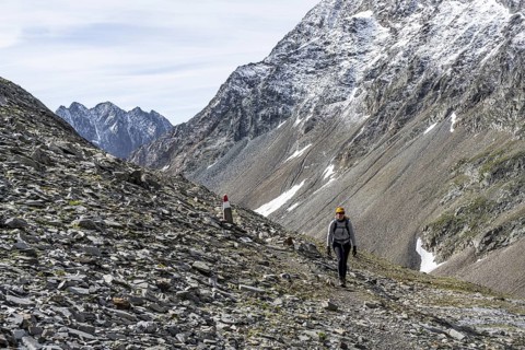Mountaineer on a rocky hiking trail, ascent to the summit of Böses Weibl, Wiener Höhenweg, Schober