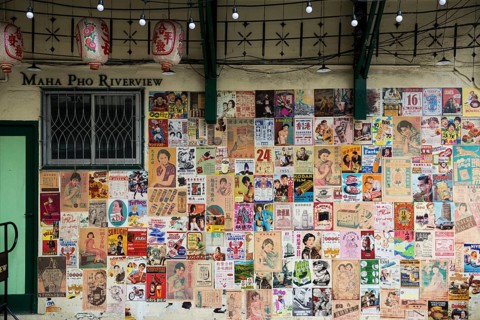 House wall with old posters and advertising, Chinatown, Bangkok, Thailand