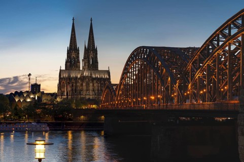 Cologne Cathedral and the Hohenzollern Bridge illuminated with LED lights, Cologne, North