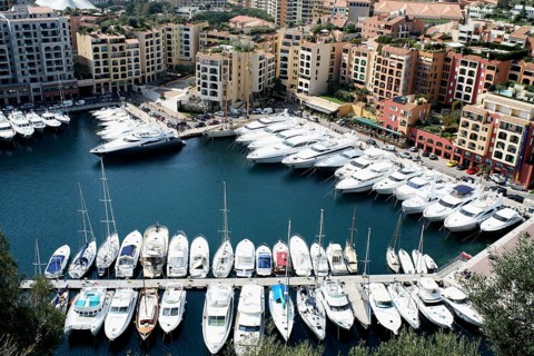 Port Hercule harbour, with numerous yachts and buildings of the city, Monaco