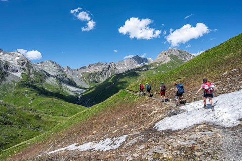 Group of mountaineers on a hiking trail on the Daberlenke, view of rocky mountain peaks in the