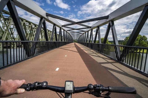 Ride over the De Massover cycle path bridge, over the Meuse south of Nijmegen, near Cuijk, part of