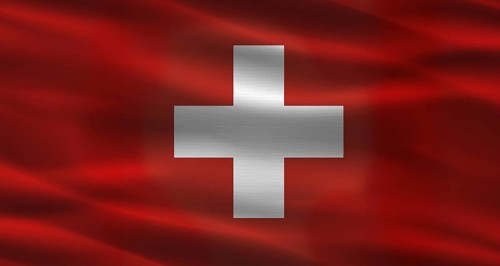 Switzerland flag with fabric texture. Realistic flag of Switzerland waving