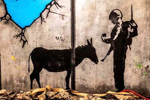Banksy - The Separation Barrier and Bethlehem Murals, barrier between Israel and the occupied West