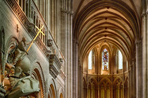 Interior view, angel on pulpit, holding a shining golden sword, Cathédrale Notre-Dame de Bayeux,