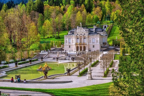 Water parterre with the portal of Linderhof Castle in spring, municipality of Ettal, Ammergau Alps,