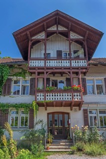 Old villa with wooden shingle façade, large balcony with floral decorations, around 1900, Dornbirn,