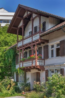 Old villa with wooden shingle façade, large balcony with floral decorations, around 1900, Dornbirn,