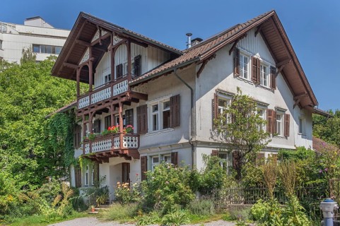 Old villa with wooden shingle façade, large balcony with floral decorations, around 1900, Dornbirn,