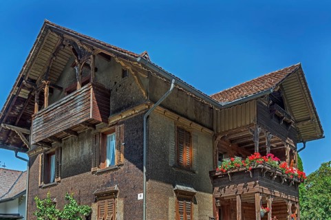 Old villa with wooden shingle façade, large balcony with floral decorations, around 1900, Dornbirn,