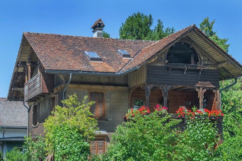 Old villa with wooden shingle façade, large balcony with floral decorations, around 1900, Dornbirn,