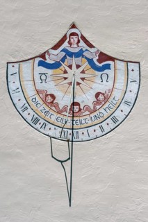 Sundial with the saying, time hurries-divides-and heals, Church of the Assumption of the Virgin
