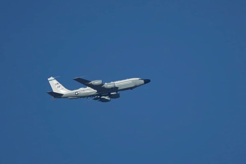 RC-135W Rivet Joint military jet aircraft of the United States Air Force USAF flying, England,