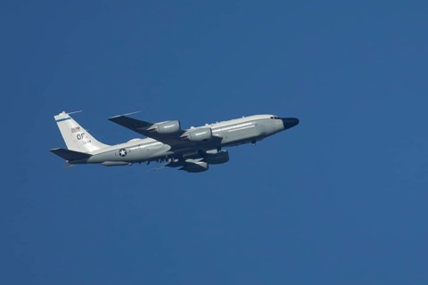 RC-135W Rivet Joint military jet aircraft of the United States Air Force USAF flying, England,
